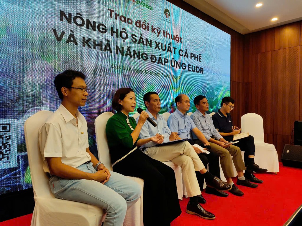 A panel discussion at a technical exchange event on coffee production and EU regulations in Buôn Ma Thuột, Vietnam.